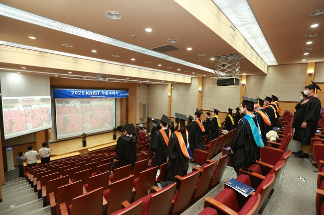 Graduates were divided into three groups to attend at three different places and watched the ceremony via Zoom.