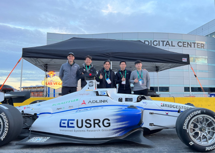 A self-driving race car with an algorithm designed by Team KAIST speeds up on the track of the Las Vegas Motor Speedway on Jan. 7, 2022. The team finished 4th in the inaugural CES Autonomous Racing Competition